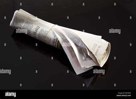 Rolled Up Newspaper Hi Res Stock Photography And Images Alamy