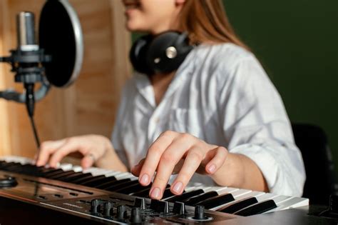 Free Photo Female Musician Playing Piano Keyboard Indoors And