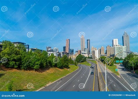 Scenic View Of Skyscrapers And Asphalt Roads Under The Clear Blue Sky