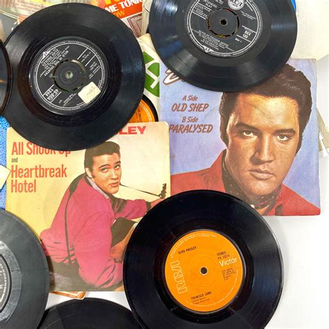 Lot 111 - ELVIS PRESLEY. Over fifty 7" singles