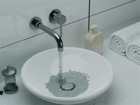 Premium Photo White Sink With Running Water From Faucet