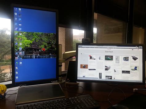 Dual monitor setup at work. One portrait and one landscape, made ...