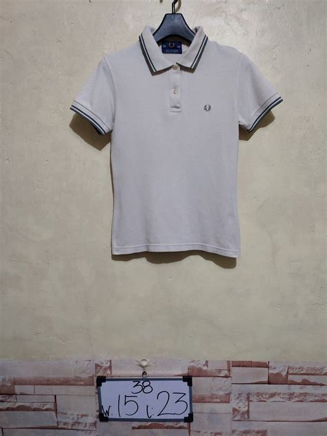 Fred perry polo shirt (cream color) on Carousell