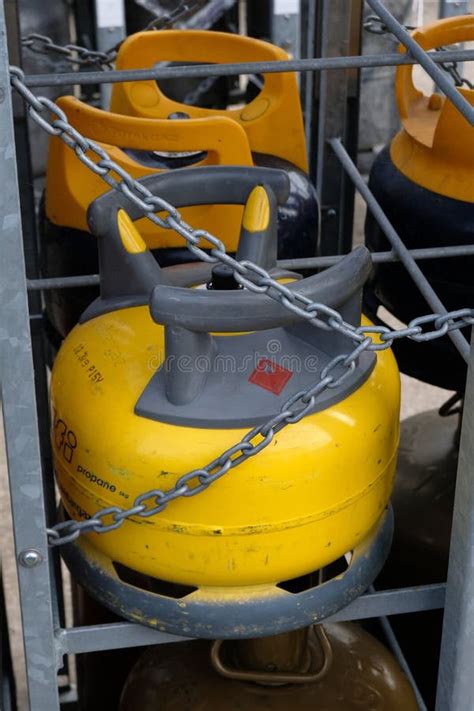 Close Up Pressurized Gas Cylinders In A Rack Editorial Stock Image