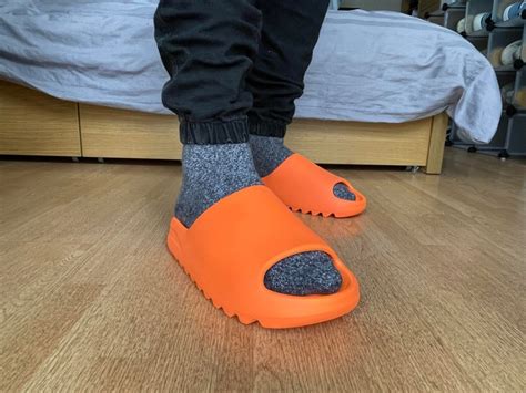 Yeezy Slides 'Enflame Orange' - SneakerCool.com