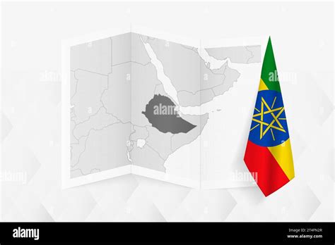 A Grayscale Map Of Ethiopia With A Hanging Ethiopian Flag On One Side