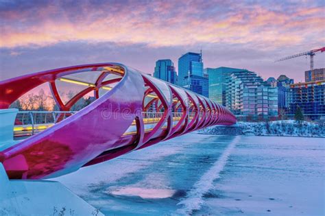 Sunrise Over Peace Bridge in Calgary with Frozen Ice and Snow-covered ...