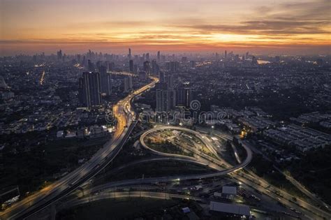 Cityscape Sunrise From Bird Eye View With Dramatic Cloud Stock Image