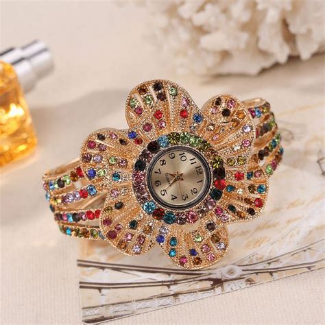 Fashion Crystal Flower Shape Dial Hollow Metal Strap Women Quartz Watch