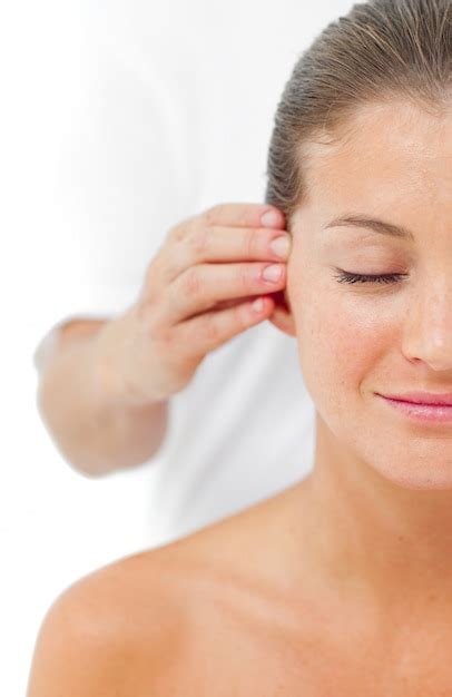 Premium Photo Young Woman Having A Head Massage In A Spa