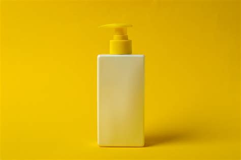 Premium Photo Bottle Of Sunscreen On Yellow