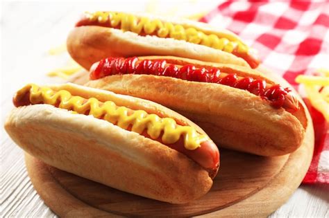 Premium Photo Hot Dogs With Fried Potatoes Closeup