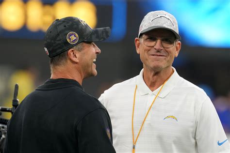 Jim Harbaugh John Harbaugh Share Moment Before Chargers Ravens Clash Athlon Sports