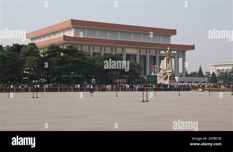 Tourists In Tiananmen Square Waiting In Line To See Mao Zedong Stock