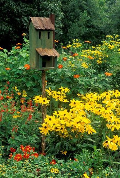 Bring Birds And Butterflies Into The Garden Garden Birdhouses Rustic