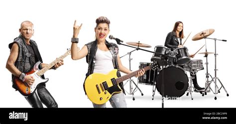 Two Female And One Male Musician In Rock Band Performing Isolated On White Background Stock