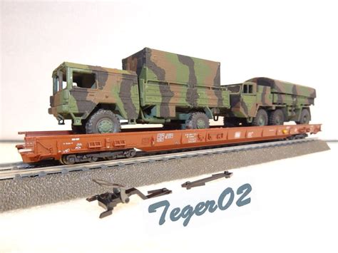 Märklin H0 DB Hupac Wagen mit LKW Acheter sur Ricardo