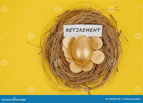 Golden Egg And Coins With Retirement Word On Nest Stock Photo Image