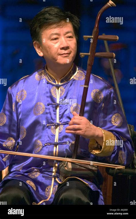 Musicians Plays A Traditional Chinese String Instrument For An