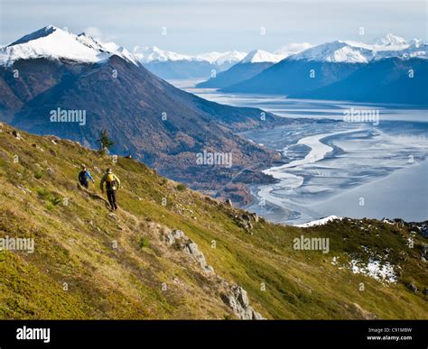 Trail Runners Traverse Tundra On Indian Peak Above Indian Chugach