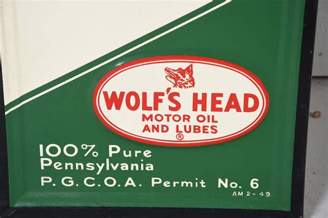 Lot Detail Wolf S Head Motor Oil Embossed Tin Vertical Sign