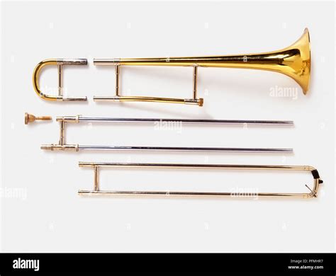 Trombone split into component parts Stock Photo - Alamy