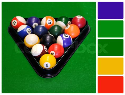 Billiard balls in a green pool table with palette color swatches ...