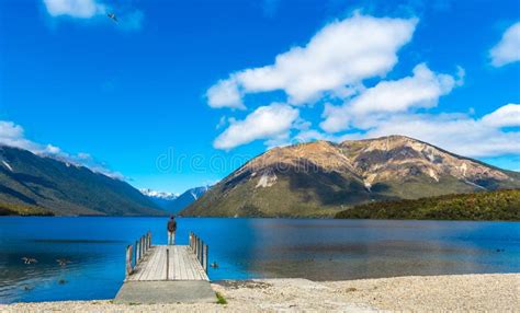 Man On The Pier Rotoiti River Nelson Lakes National Park New Zealand