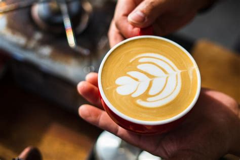 Premium Photo How To Make Coffee Latte Art By Barista Focus In Milk