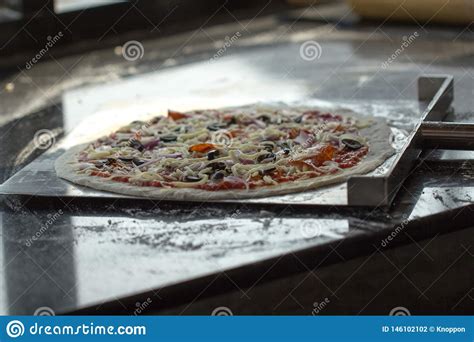 Preparing Pizza Margherita Freshly Prepared Unbaked Cooking In Kitchen