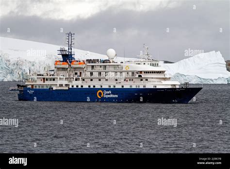 Exploring Antarctica - Quark Expeditions Sea Spirit Cruise Ship sailing among the Icebergs ...