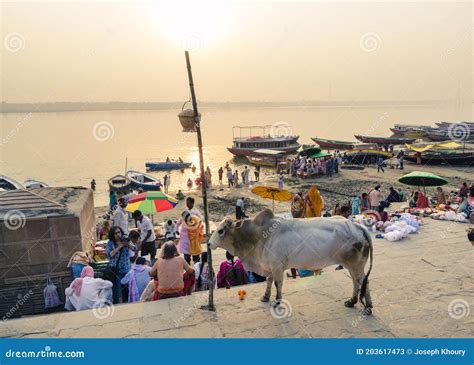 People Gathered in Assi Ghat at Sunrise, Varanasi, India Editorial ...