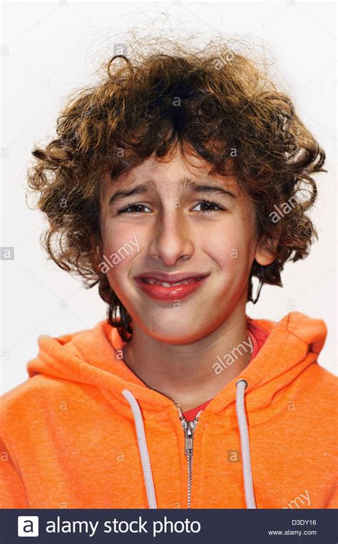 Boy portrait with a funny bitter face Stock Photo - Alamy