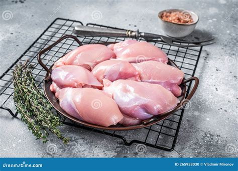 Boneless And Skinless Raw Chicken Leg Thigh Fillet Gray Background