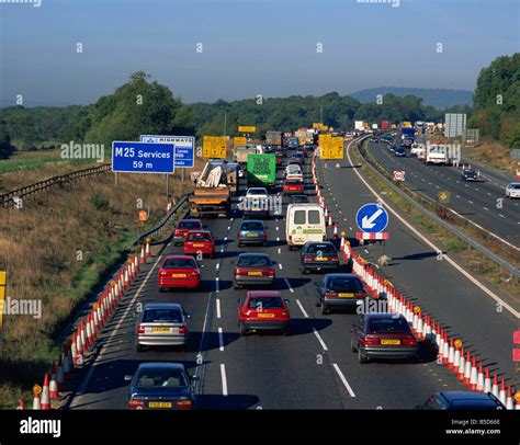 Roadworks causing traffic jam on the M25 England UK R Tomlinson Stock ...