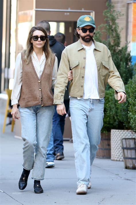 Elizabeth Olsen With Her Husband in New York 10/25/2023 • CelebMafia