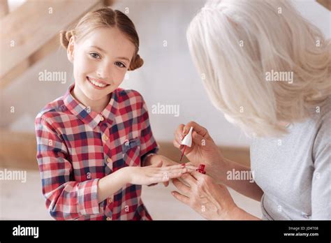 Happy Beautiful Girl Having Her Nails Done Stock Photo Alamy