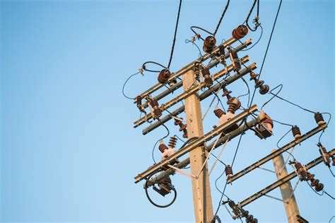 Premium Photo Electricity Post With Blue Sky Background And Copy Space