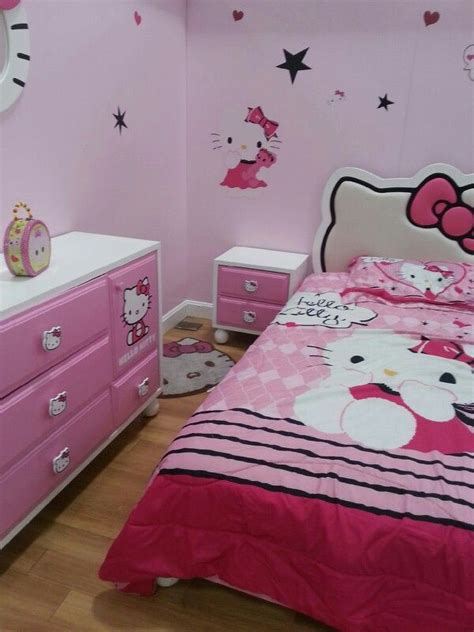 a hello kitty bedroom with pink furniture and decor on the walls ...