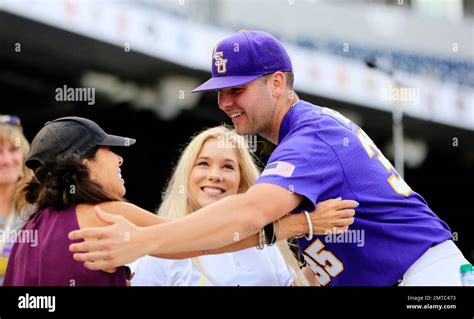 Lsu Pitcher Alex Lange 35 Hugs A Loved One As His Girlfriend Ashlyn