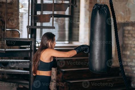 Young woman boxing workout at the gym 11783291 Stock Photo at Vecteezy