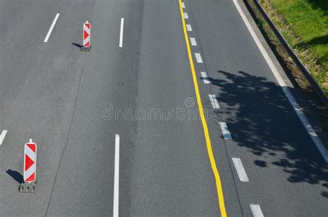 Horizontal Road Marking Lanes Highway Concrete Barriers On The Road