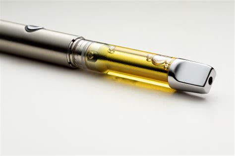 High Thc Potency Cannabis Oil Vape Pen Stock Photo - Download Image Now ...