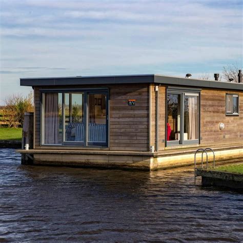 50 Tiny Houses That Actually Float Houseboat Living House Boat