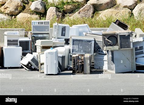 Pile Of Disposed Or Broken Air Conditioners At A Recycling Center Stock