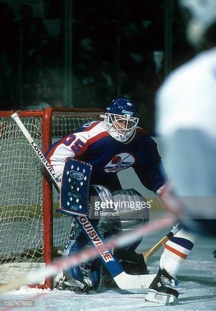 Goalie Dan Bouchard Of The Winnipeg Jets Defends The Net During An