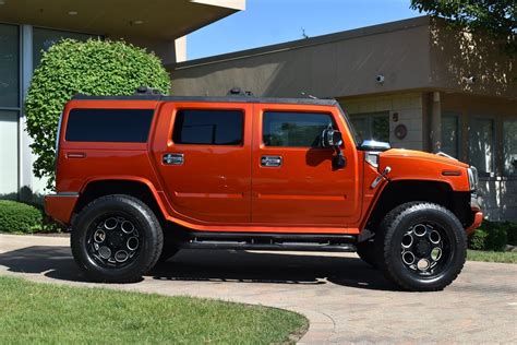 Orange Hummer H2 Truck