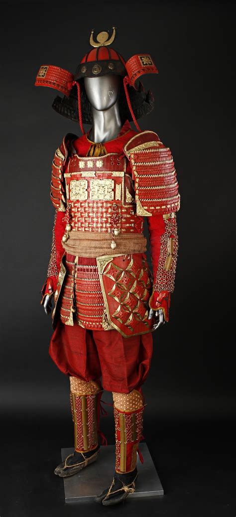 An Elaborately Decorated Suit And Helmet On Display