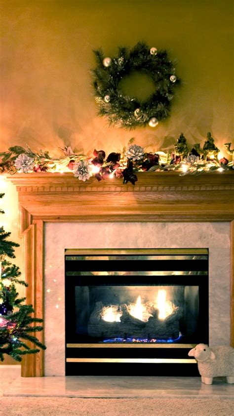 Christmas Fireplace Scene 540x960 - Wallpaper - FreeChristmasWallpapers.net