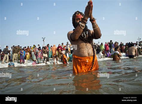 Sadhu Praying To Sun In Ganga River Kumbh Mela At Allahabad Uttar Stock